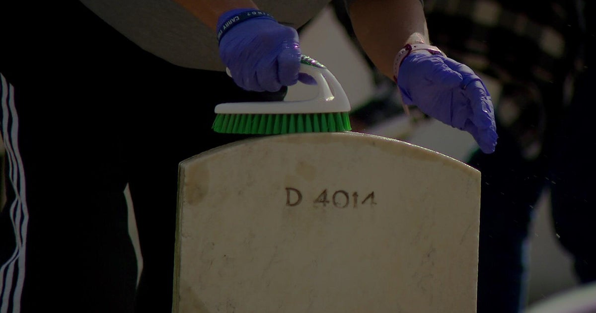 Volunteers clean Fort Snelling grave markers in act of remembrance