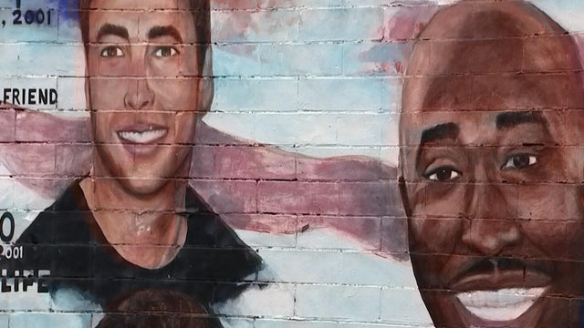 Close-up view of victims' faces on a mural in West Philadelphia 