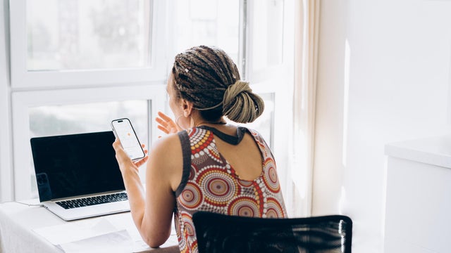 Portrait of a woman with laptop 