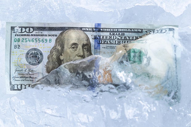 One Hundred Dollar Bill Frozen in Ice