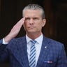 Defense Secretary Pete Hegseth salutes as he welcomes Germany's defense minister at the Pentagon in Arlington, Virginia, Sept. 15, 2026. 