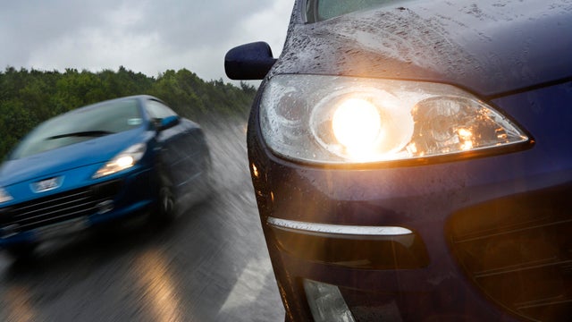 cars on motorway in the rain 