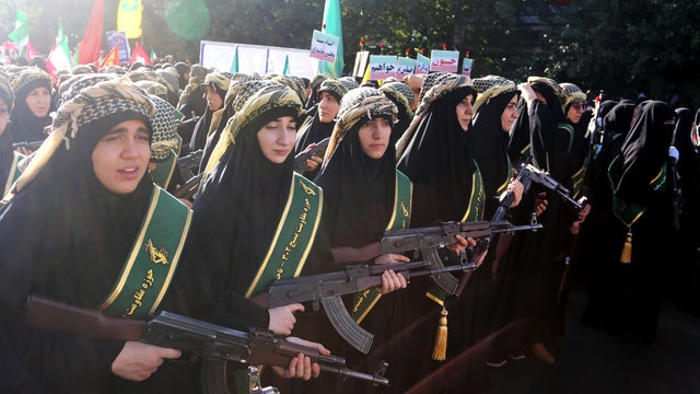 Armed volunteers march through central Tehran in Basij-led mobilization rally 