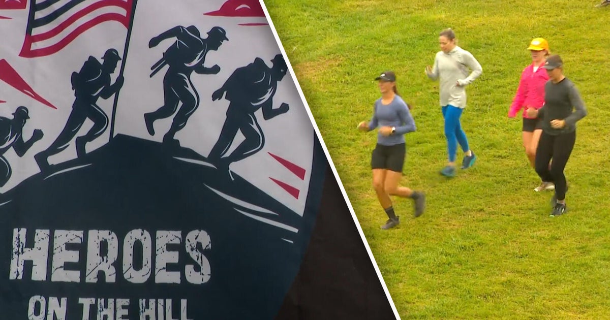 Dozens embrace cold and rain for Heroes on the Hill challenge in Burnsville
