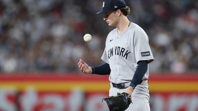 Starting pitcher Cam Schlittler #31 of the New York Yankees reacts while pitching against the Arizona Diamondbacks during the sixth inning of the MLB game at Chase Field on September 19, 2026 in Phoenix, Arizona. 