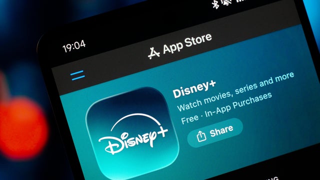 In this photo illustration, the Disney Plus logo is seen 