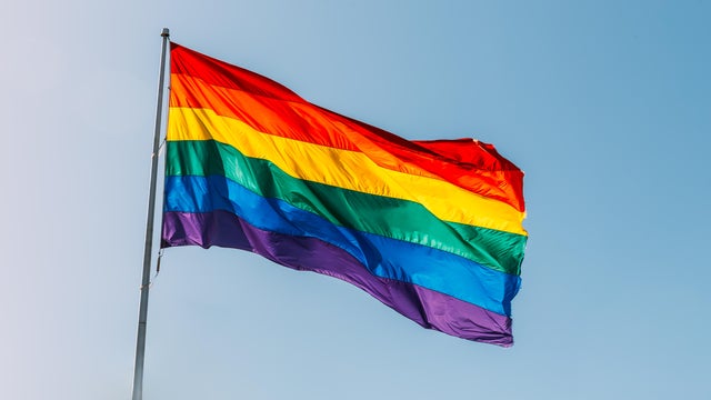 Rainbow flag waving in the wind in Castro District, San Francisco, California, USA 