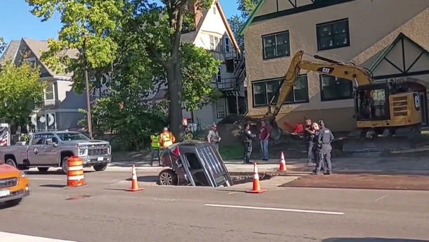 5p-pkg-mpls-car-into-construction-hole-wccobc3z.jpg
