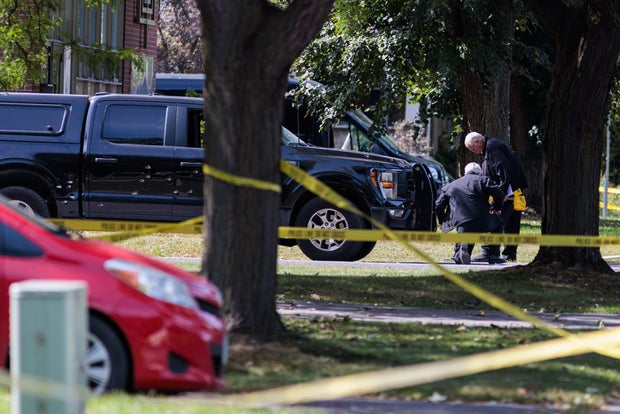 Scene from outside the Sons of Jacob Synagogue where a man armed with a shotgun exchanged gun fire with a police officer stationed outside of the Synagogue late Sunday evening as people were arriving for Yom Kippur.