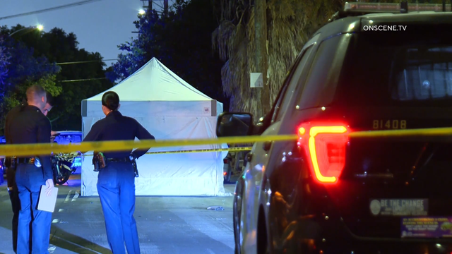 Generic police lights and yellow police tape at crime scene 