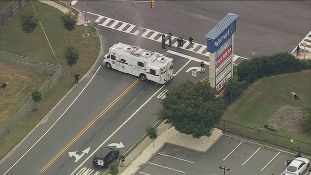 Overhead image of police in the street near a shopping center in Lower Township 