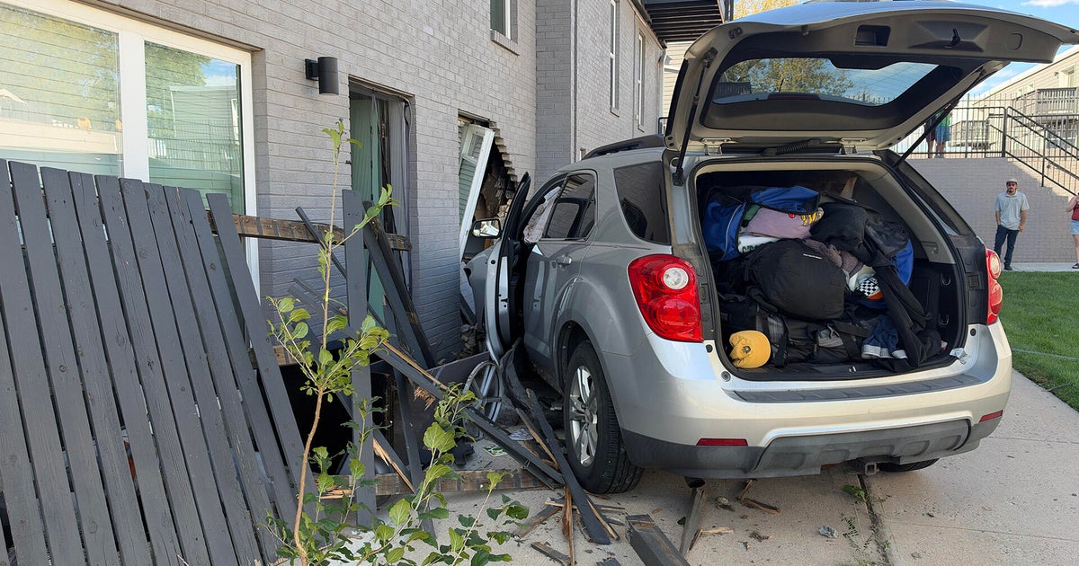 Car crashes into apartment building after Colorado domestic disturbance