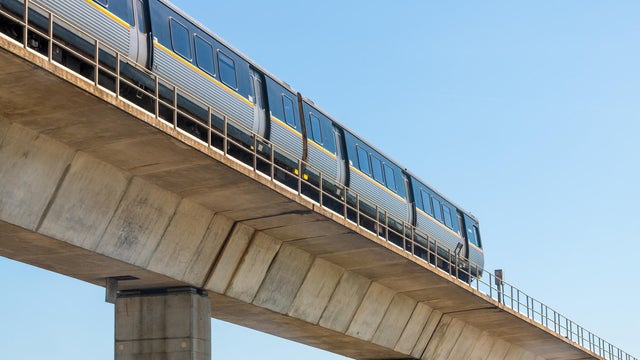 Metropolitan Atlanta Rapid Transit Authority Marta subway train public transportation on overpass outside 