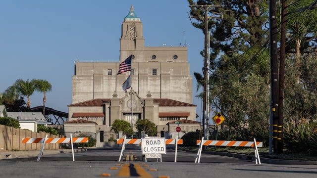 A fire broke out today in an outdoor battery storage unit at a Metropolitan Water District facility in La Verne, prompting evacuation orders and forcing crews into a defensive posture as flames rose from a building on the sprawling grounds. 