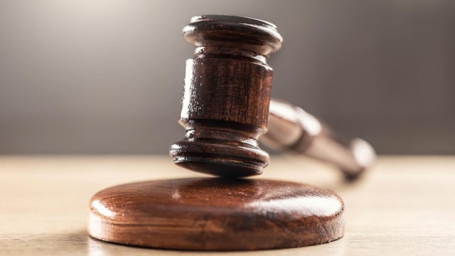 Former Detroit fire dispatcher accused of tipping off family of search warrant