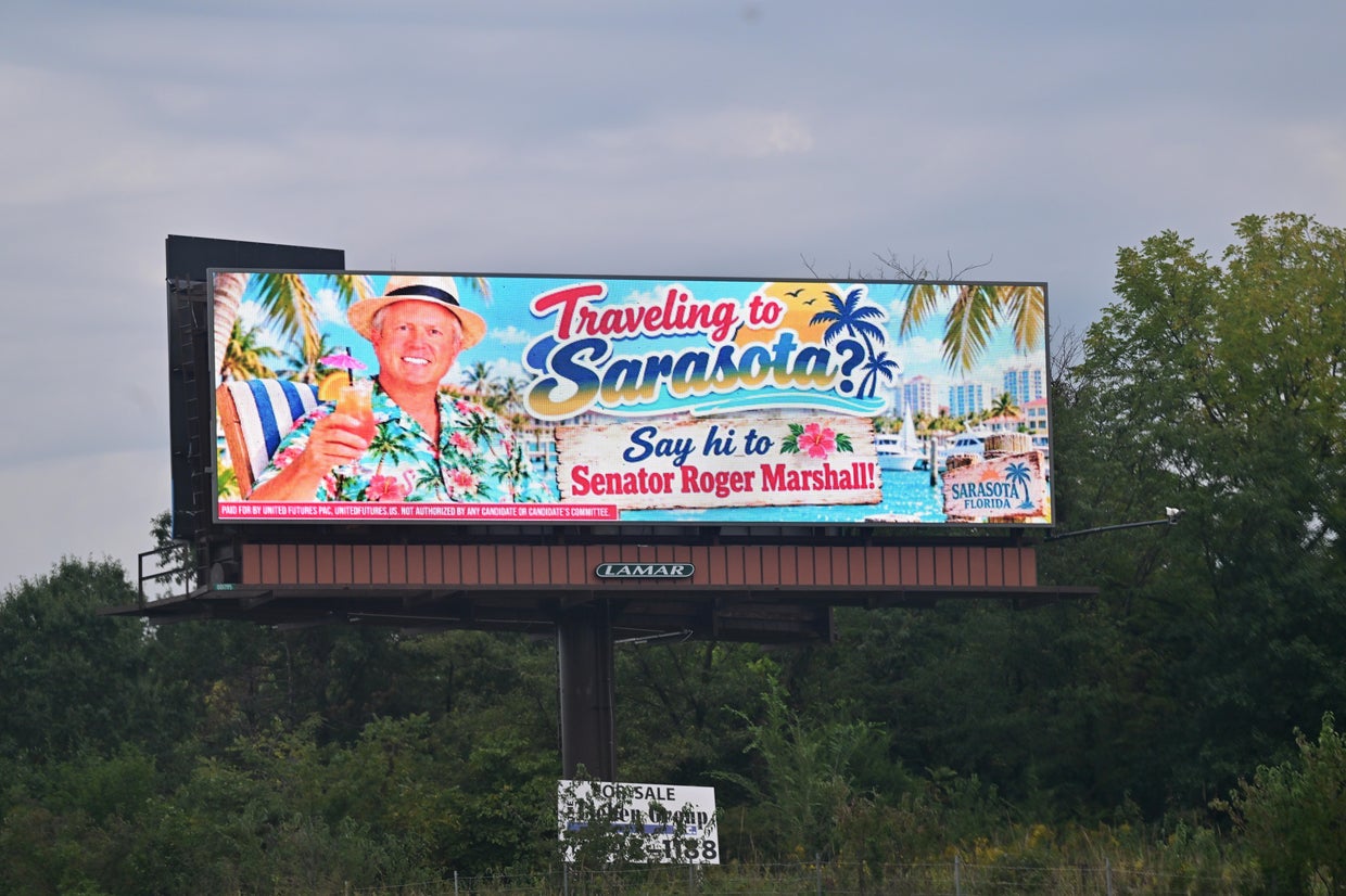 Billboard Calls Attention To Kansas Senator Roger Marshall's Life In Florida 