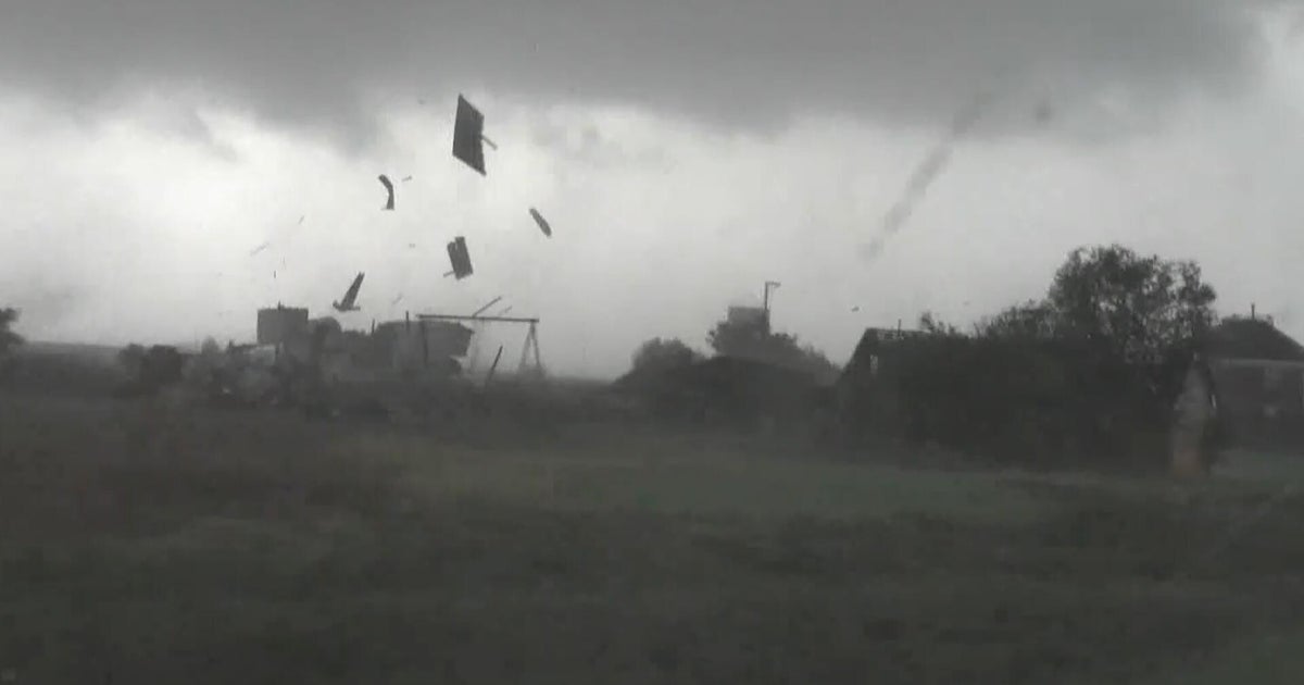 Debris flies across central Kansas as storms slam Plains