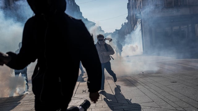 Demonstrators clash with police officers during a student protest in Nancy, France, Oct. 5, 2026. 