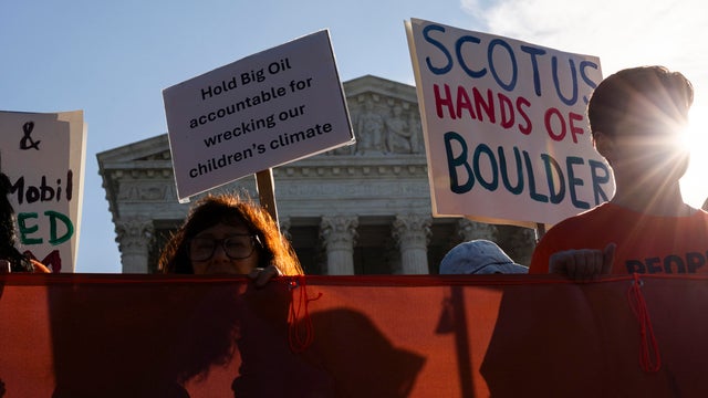 Environmental Activists Protest Against Oil Companies As Supreme Court Begins New Term 