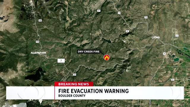 Evacuation warning issued for homes near wildfire burning in Boulder County