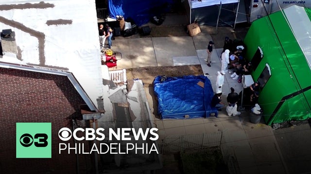 Police enlist K-9s to help search "house of horrors" in Philadelphia's Olney section, sources say