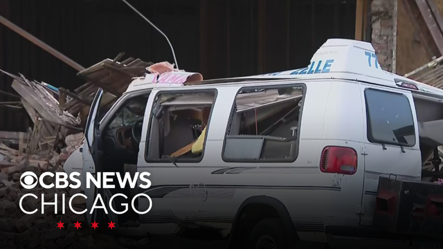 Van crashes into building on West Side