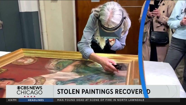 Stolen Renoir paintings found behind wall