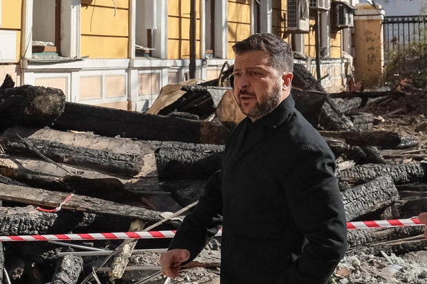 Ukraine's President Volodymyr Zelenskyy views harm  from a drone onslaught   successful  Kyiv 