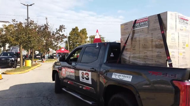A truck carrying a pallet of food 