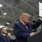 Trump pardons 2 auto workers on stage during rally in Alaska