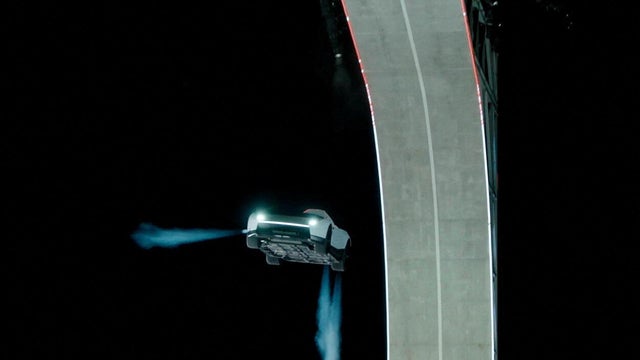 Tesla unveils its long-delayed Roadster at a launch event in Waco, Texas, Oct. 15, 2026, in this still image taken from a handout video. 