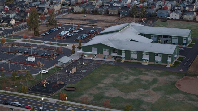 A drone view shows Silver Rail Elementary School the day after a deadly mass shooting in Bend, Oregon, Oct. 16, 2026. 