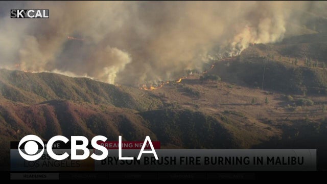 Crews battle Malibu brush fire as Red Flag Warnings are in place