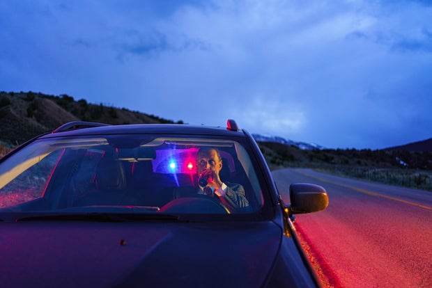 Drunk Driving Man Being Pulled Over by Police