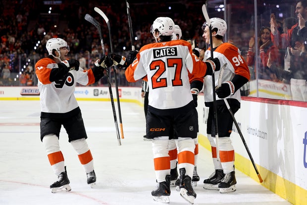 Porter Martone #94 of the Philadelphia Flyers celebrates his goal with teammates during the second period against the Ottawa Senators