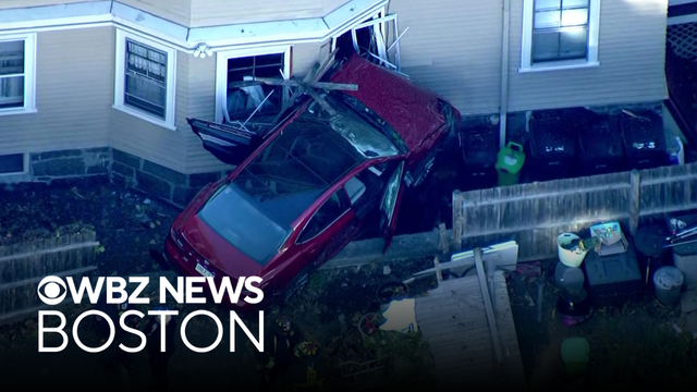 Car crashes into home in Jamaica Plain
