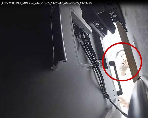 doj-alfozan-checking-on-device.jpg