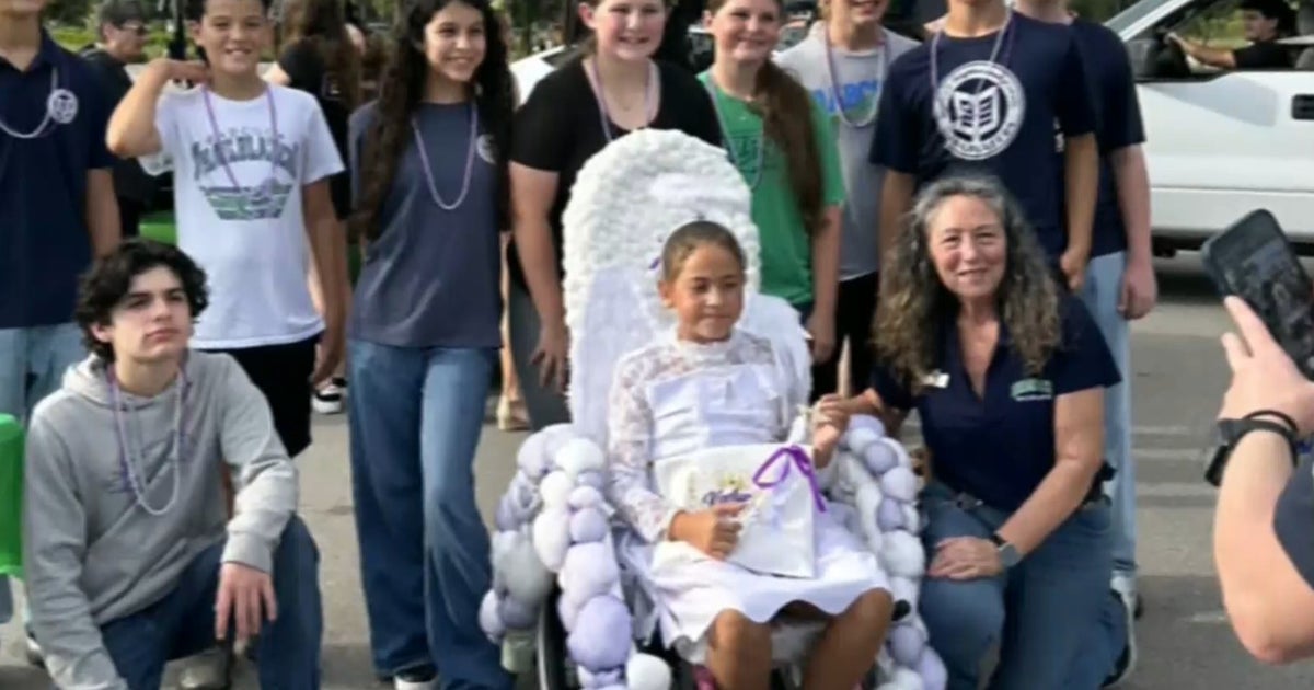 Eighth graders rally around new classmate to help her dazzle at big Halloween party