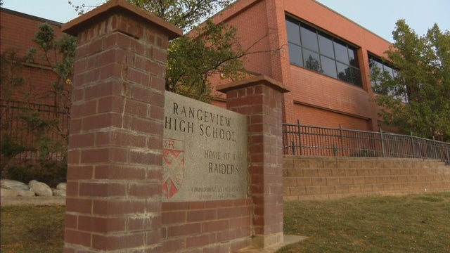Man arrested after road rage incident, shots fired outside Aurora area high school