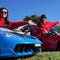 Women trying to ride toy cars toward a Guinness World Record