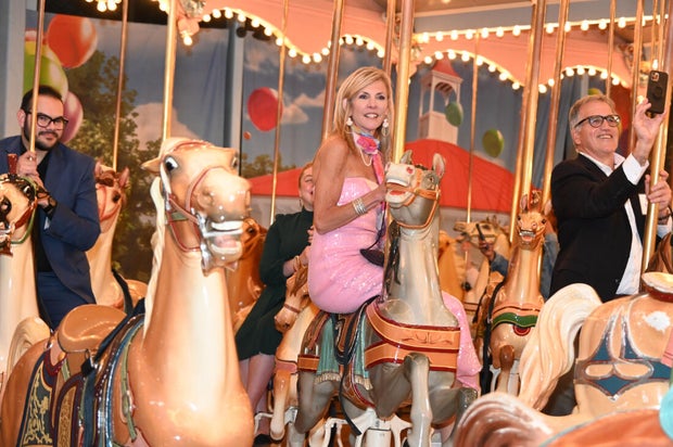 People pose for photos at a gala at the Please Touch Museu,
