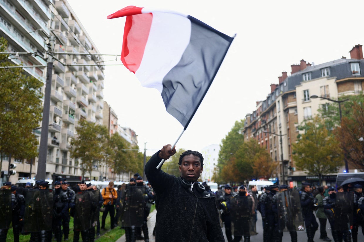 Clashes break out between police and protesters in France after largely peaceful demonstrations