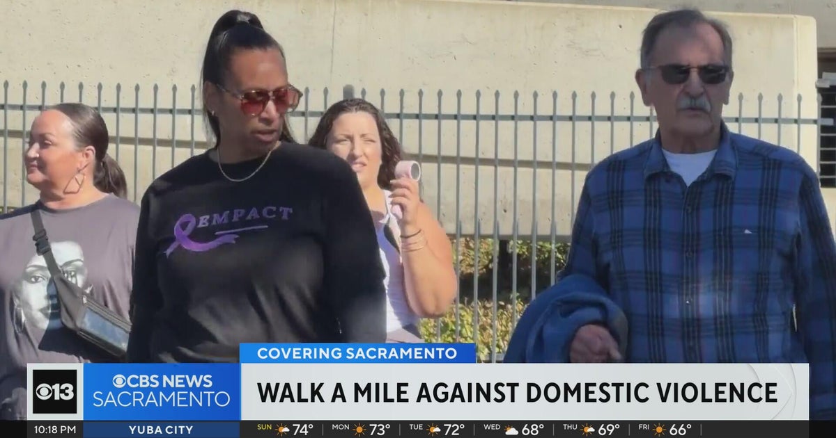Dozens take to Sacramento County streets to raise awareness for domestic violence
