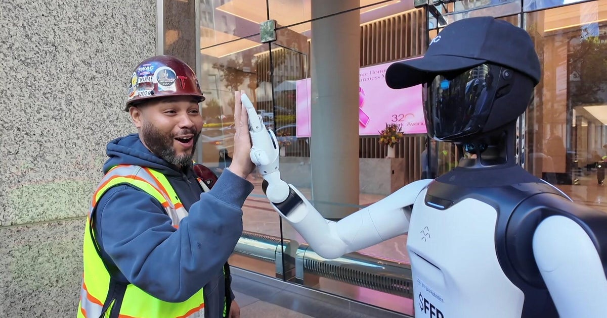 cbsnews.com - Elle  McLogan - Video shows humanoid AI robot roaming NYC streets