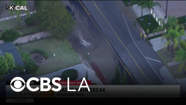 Water main break in Woodland Hills closes street
