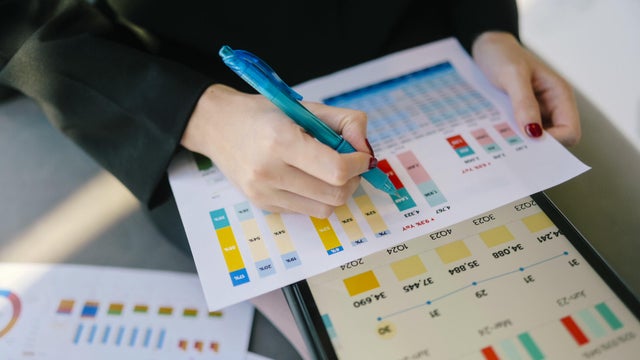Digital entrepreneur managing taxation workflow through cloud-based financial Freelancer analyzing income reports for tax submission using laptop and digital accounting platform 