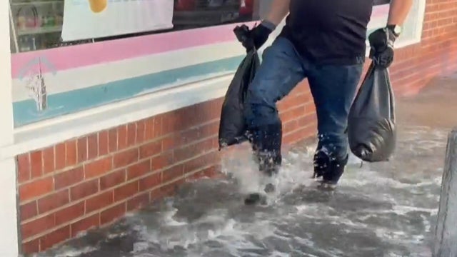 Flooding hits both coasts