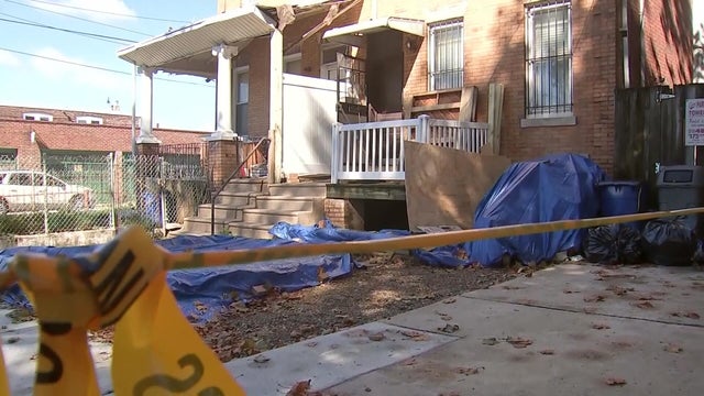Yellow police tape is seen blocking off access to the Horsch house in the Olney section of Philadelphia 