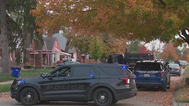 Flashing Lights, Hood of Cop Car, and Police Line Do Not Cross 