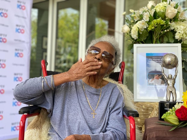 6-toni-vaz-blowing-kiss-beside-her-naacp-image-awards-founders-award-display-recognizing-her-as-founder-and-creator-of-naacp-image-awards.jpg